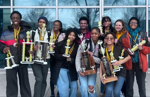  Students posing with trophies